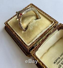 A Stunning Gold Black Enamel Snake Ring Set With Ruby Eyes Circa 1800s