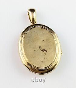 Antique 18ct gold mourning locket, black enamel cross pendant