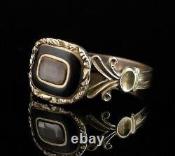 Antique Georgian mourning ring, hairwork, black enamel, 12ct gold