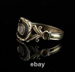Antique Georgian mourning ring, hairwork, black enamel, 12ct gold