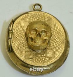 Antique MEMENTO MORI/MOURNING SKULL gold plated and black enamel locket pendant