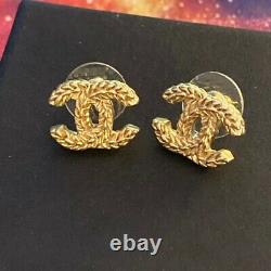 Auth Chanel CC Stud earrings, gold toned rope pattern