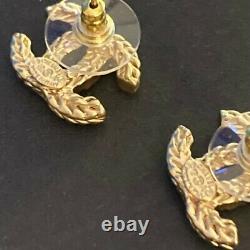 Auth Chanel CC Stud earrings, gold toned rope pattern