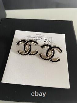 Genuine Chanel black enamel/gold classic cc stud earrings