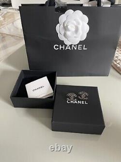 Genuine Chanel black enamel/gold classic cc stud earrings