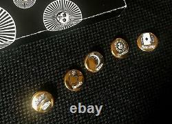 Rare set of Piero Fornasetti gold tone enamel set of 5 charms buttons