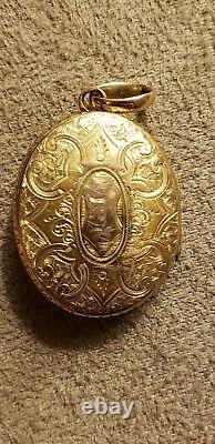 Victorian gold with black enamel cross photo locket