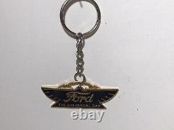 Vintage metal FORD Enameled Key Fob Black And Gold Collector